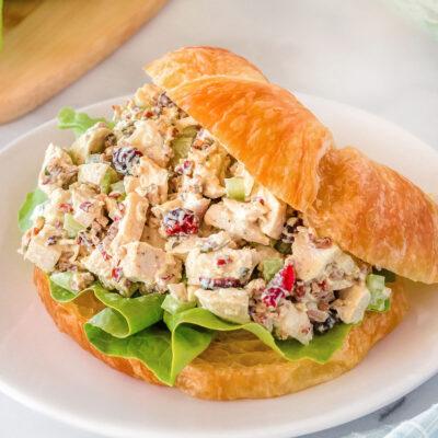 chicken salad recipe served on a croissant roll