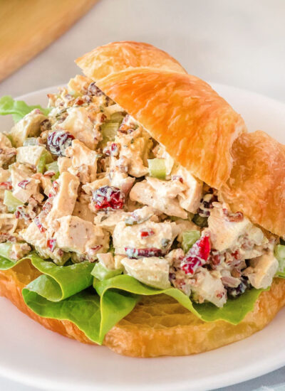 chicken salad recipe served on a croissant roll